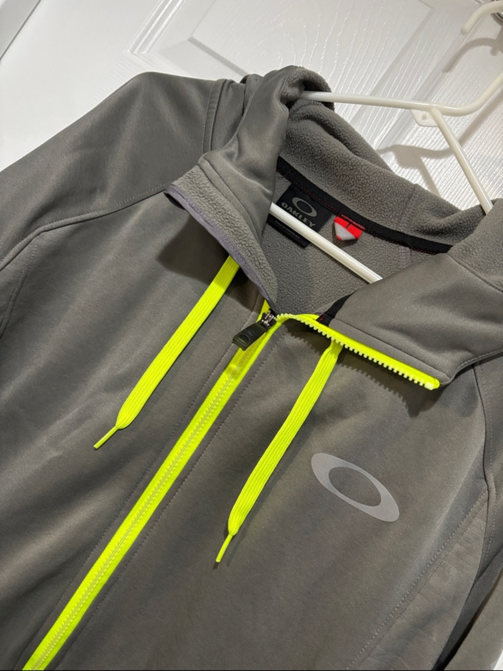 OAKLEY Performance Jacket in Gray with Neon Highlights